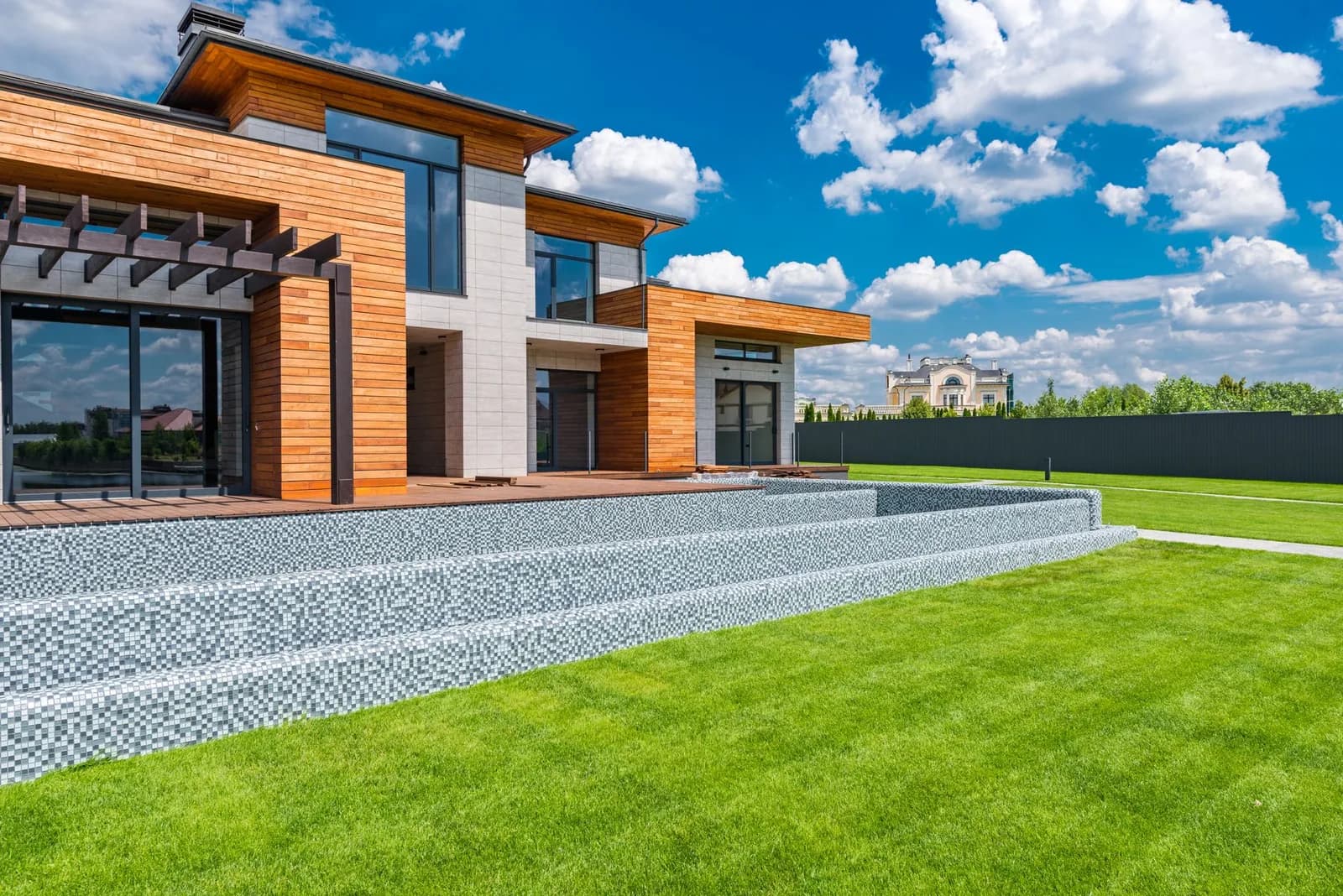 A ground-up custom home on a wooded slope