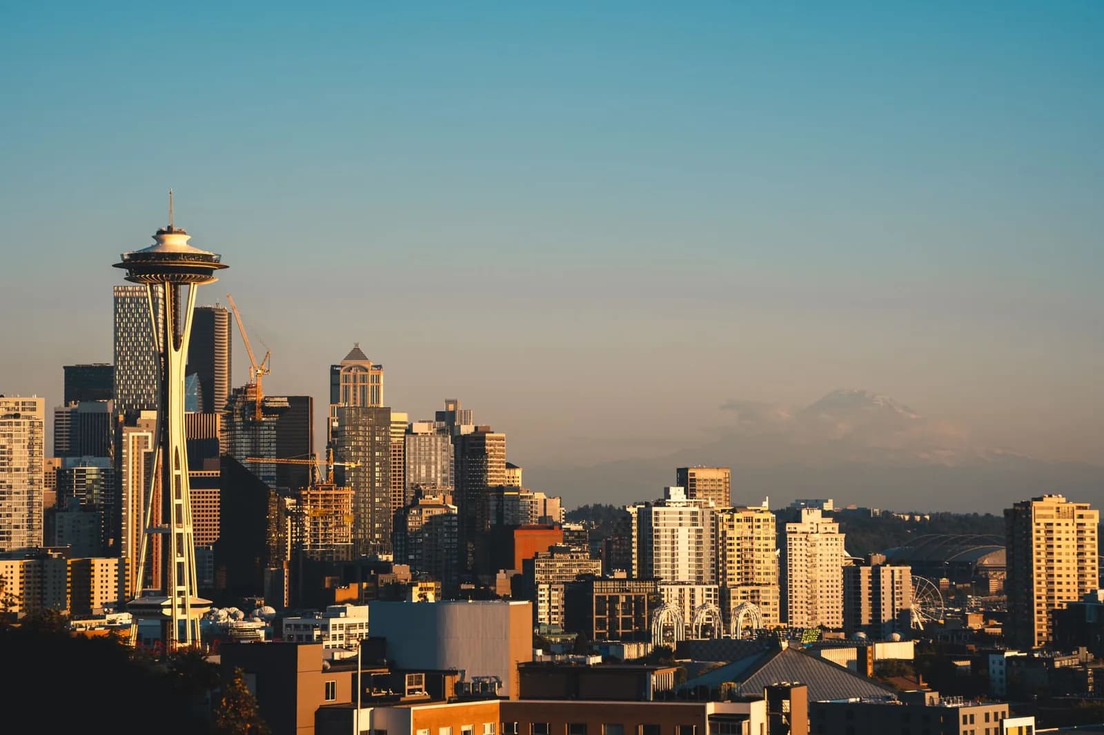 Stunning view of Seattle's skyline featuring the iconic Space Needle during sunset.