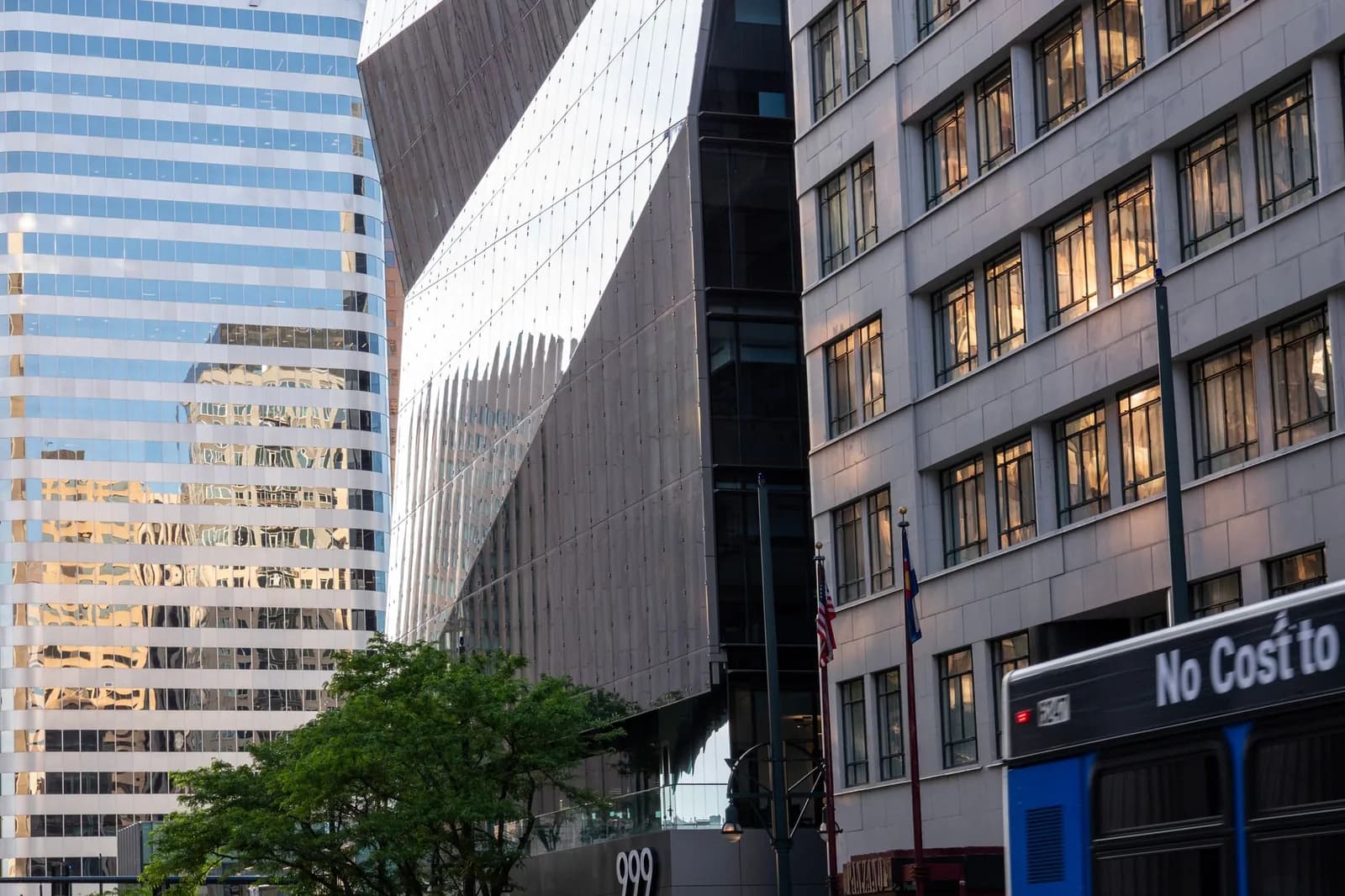 Capture of reflection and architecture in Denver's bustling downtown area.