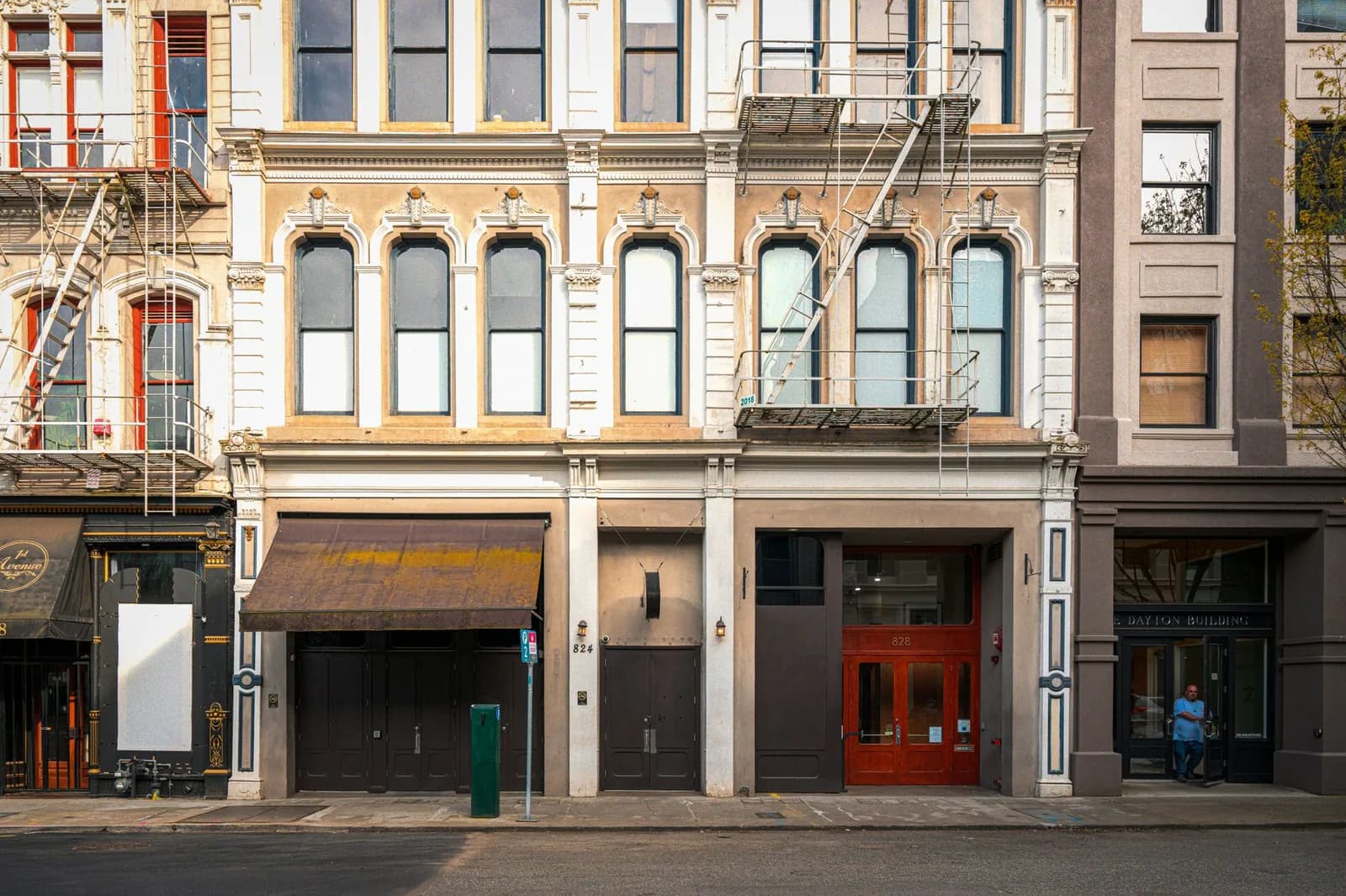 A historic building facade with fire escape in Portland's architectural district.