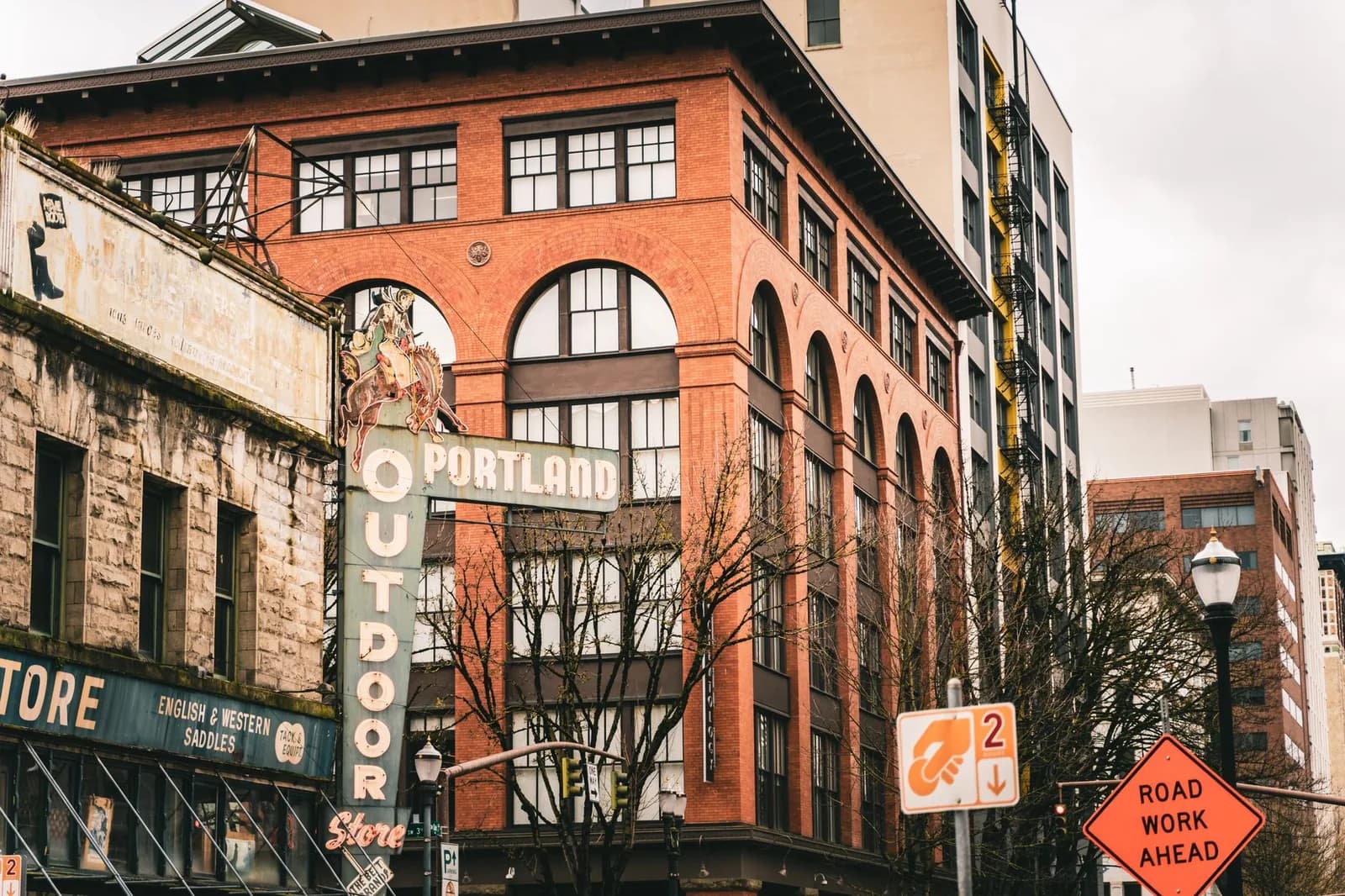 Street view capturing Portland's historic building facade with signage.