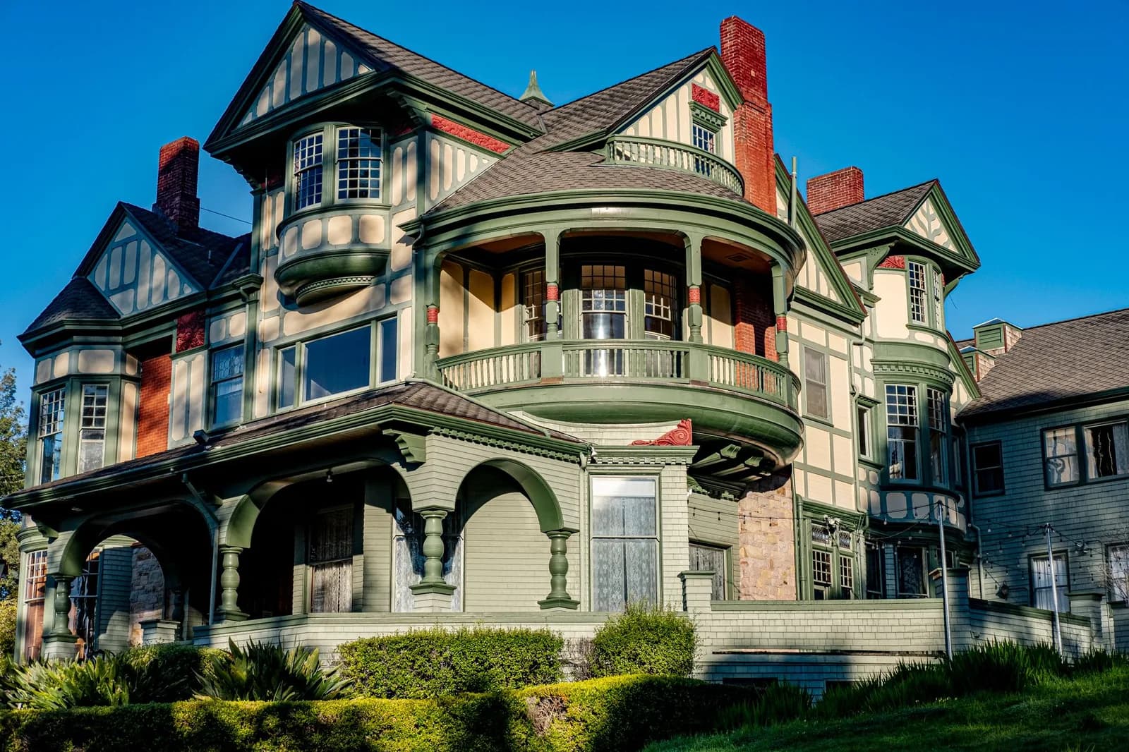 A stunning neoclassical residence showcasing elegant architectural details with columns and intricate facade.