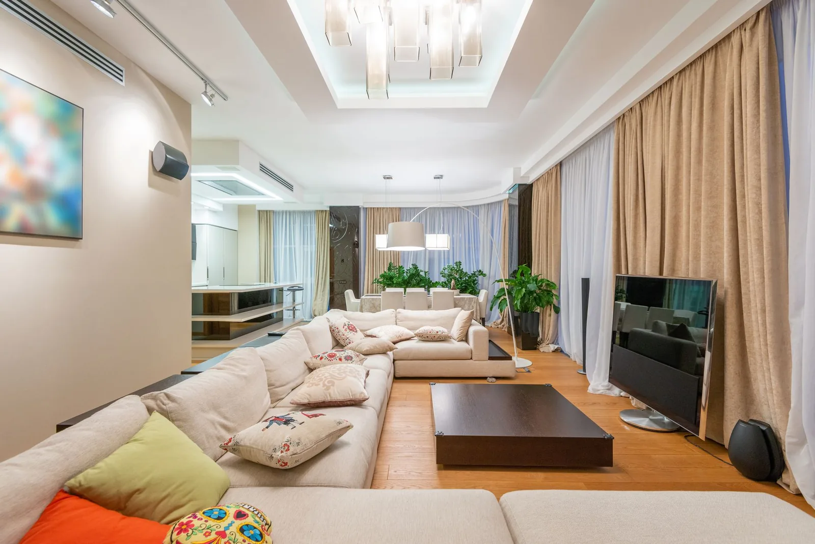 Sunken lounge around a plaster fireplace