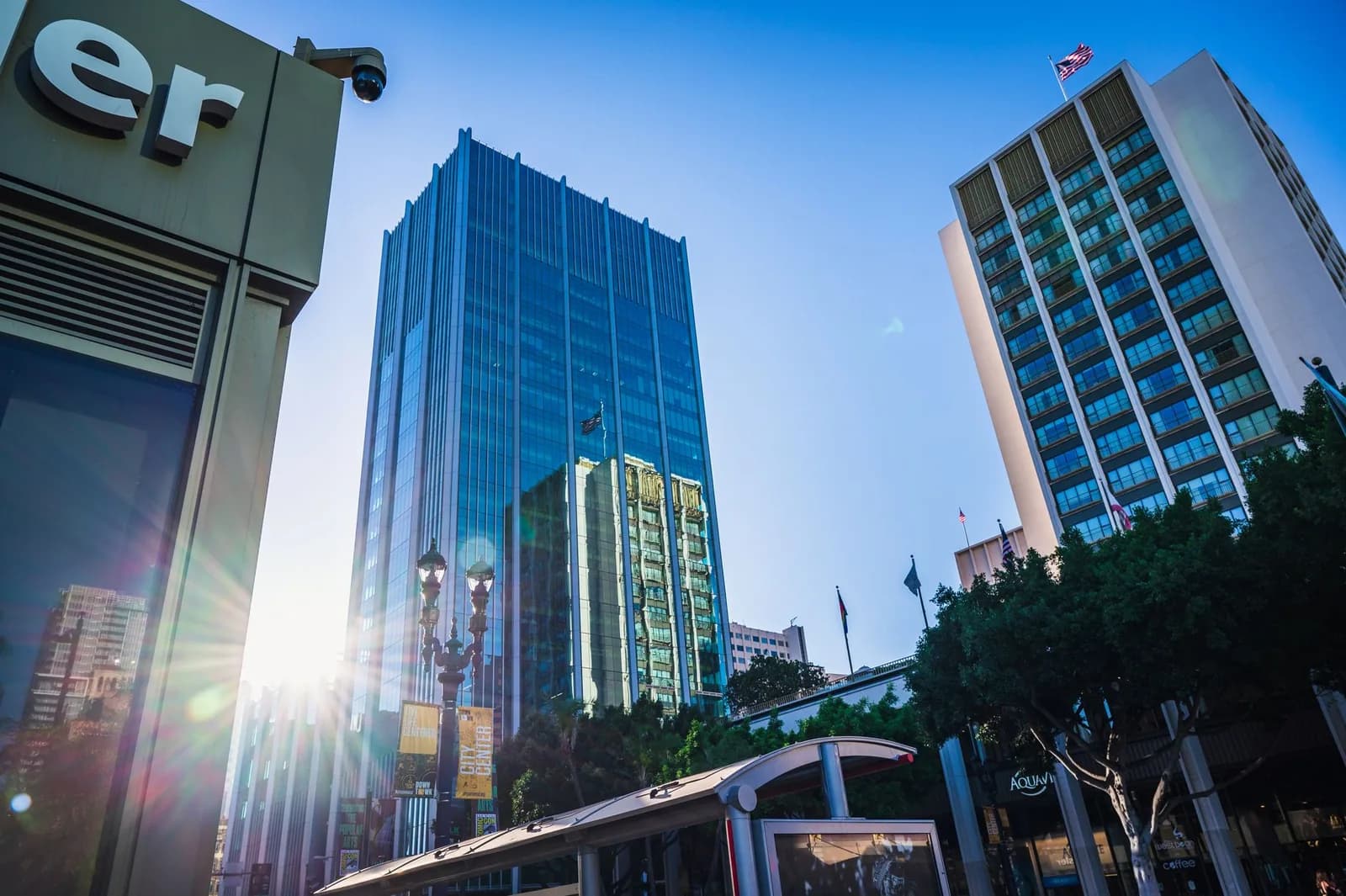 Cityscape view of downtown San Diego with tall buildings under a clear blue sky.